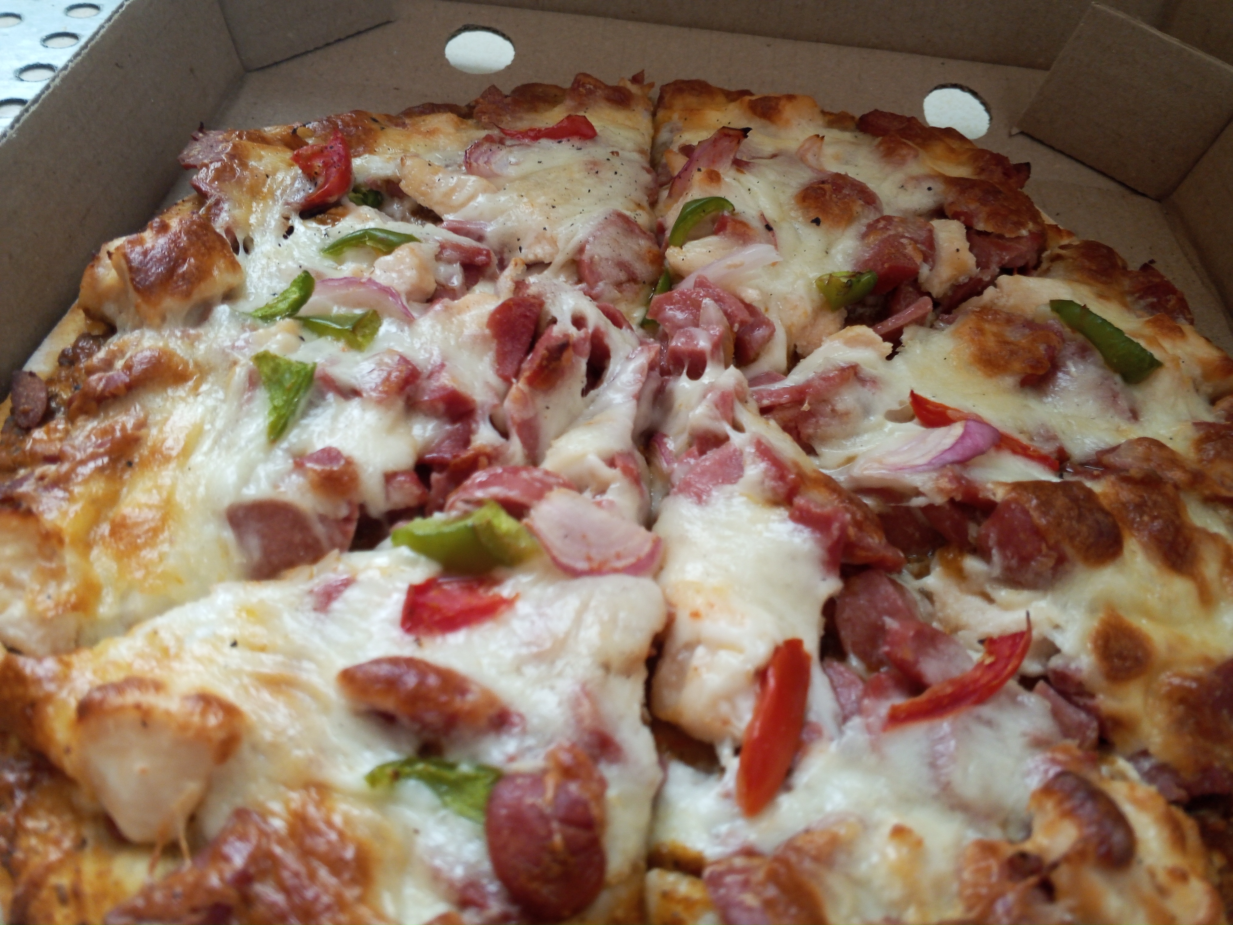 Chicken and sausage pizza